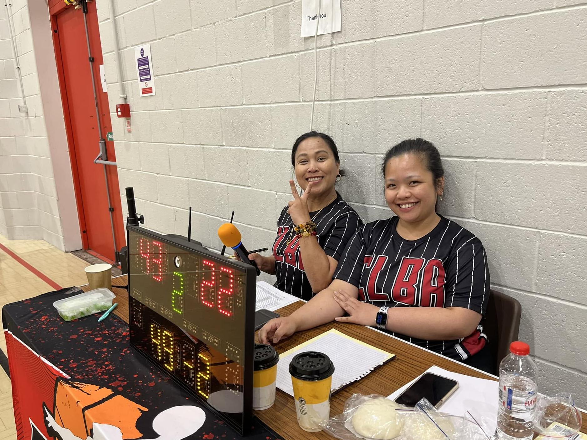 A group of women volunteering as time keepers